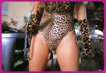 bodysuit cleavage collar gloves kumada_youko leash leopard_print tail rating:Safe score:1 user:nil!