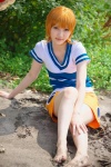 beach cosplay kuuya miniskirt nami_(one_piece) ocean one_piece orange_hair skirt tshirt rating:Safe score:1 user:nil!