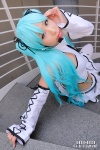 aqua_hair cosplay detached_sleeves hair_ribbons hatsune_miku microphone miniskirt nei project_diva skirt twintails vocaloid rating:Safe score:0 user:pixymisa