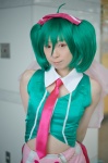 collar cosplay cuffs green_hair hairbow macross macross_frontier miki ranka_lee red_eyes shorts tie twintails vest rating:Safe score:0 user:pixymisa