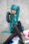 aqua_hair blouse cosplay detached_sleeves hatsune_miku headset pleated_skirt shinra skirt thighhighs tie twintails vocaloid zettai_ryouiki rating:Safe score:0 user:nil!