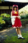 blouse cosplay detached_sleeves hairbow hakurei_reimu matsunaga_ayaka miko skirt socks touhou rating:Safe score:0 user:nil!