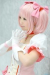 bows choker cosplay dress gloves hairbows kaname_madoka kurasaka_kururu pink_hair puella_magi_madoka_magica rating:Safe score:0 user:pixymisa