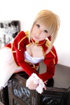 blonde_hair braid cleavage cosplay dress fate/series fate/stay_night kamui_arisa red_moon saber rating:Safe score:0 user:nil!