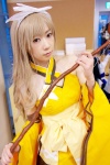 blonde_hair bow_(weapon) choker cosplay detached_sleeves dress hairbow kureha_touka shining_wind suzushiro_yuri rating:Safe score:0 user:nil!