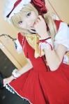 blonde_hair cosplay dress dress_lift flandre_scarlet hat jigoku_yuugi touhou wings rating:Safe score:0 user:nil!