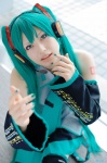 aqua_hair beng cosplay default_costume detached_sleeves hatsune_miku headset pleated_skirt skirt thighhighs tie twintails vocaloid zettai_ryouiki rating:Safe score:0 user:nil!