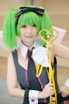 beni collar cosplay cuffs green_hair hairbow key_(item) macross macross_frontier ranka_lee red_eyes shorts tie top_hat twintails vest rating:Safe score:0 user:pixymisa