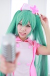 aqua_hair cosplay hatsune_miku hiiragi_haruka microphone nurse nurse_cap nurse_uniform twintails vocaloid rating:Safe score:0 user:pixymisa