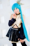 aqua_hair black_legwear cosplay croptop detached_sleeves hairbow hatsune_miku mashiro_yuki pleated_skirt ponytail project_diva skirt thighhighs vocaloid zettai_ryouiki rating:Safe score:0 user:nil!