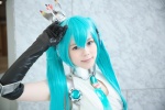 aqua_hair bodysuit cosplay crown elbow_gloves gloves haruka_(iii) hatsune_miku tagme_song twintails vocaloid rating:Safe score:0 user:nil!