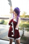 ahoge cosplay dress elbow_gloves glaive gloves ikkitousen kanu_unchou purple_hair ryuuna santa_costume spear stocking_cap rating:Safe score:1 user:nil!