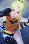armband azumi_(iii) blonde_hair cosplay elbow_gloves elbow_pad final_fantasy final_fantasy_x fingerless_glove gloves goggles holster rikku shorts top_knot twin_braids vest rating:Safe score:1 user:pixymisa
