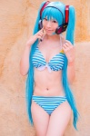 aqua_hair bikini cleavage cosplay hatsune_miku headset mashiro_yuki project_diva swimsuit twintails vocaloid rating:Safe score:1 user:nil!