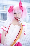 choker cosplay dress gloves hairbows kaname_madoka miiko pink_hair puella_magi_madoka_magica twintails rating:Safe score:2 user:xkaras