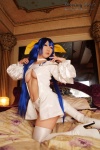bed blue_hair boots choker cleavage cosplay dizzy guilty_gear hairbows hitori_gokko monokini one-piece_swimsuit saku swimsuit tail thighhighs underboob wings rating:Safe score:0 user:nil!