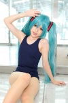 aqua_hair cosplay hatsune_miku pantyhose project_diva school_swimsuit swimsuit twintails usagi_yakuro vocaloid rating:Safe score:1 user:pixymisa