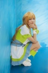 blonde_hair blouse blue_eyes boots cosplay hoshii_miki idolmaster nakura scarf_tie tiered_skirt vest rating:Safe score:0 user:pixymisa