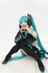 <3 aqua_hair blouse blue_eyes chica cosplay detached_sleeves hatsune_miku headset pleated_skirt skirt thighhighs twintails vocaloid zettai_ryouiki rating:Safe score:0 user:pixymisa