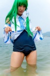 beach cosplay detached_sleeves green_hair kochiya_sanae lenfried ocean one-piece_swimsuit school_swimsuit shirt_lift swimsuit touhou wet rating:Safe score:0 user:nil!