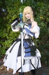 ageha blonde_hair boots breastplate cosplay detached_sleeves dress fate/series fate/unlimited_codes gauntlets hairbow saber_lily sword rating:Safe score:1 user:nil!
