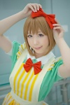 apron bowtie cosplay dress hagiwara_yukiho hairbow idolmaster pink_eyes shaa rating:Safe score:0 user:pixymisa