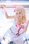 blonde_hair cosplay dress hairbow macross macross_frontier sheryl_nome thighhighs yuumin rating:Safe score:0 user:nil!