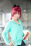 cosplay hairbow pocky puella_magi_madoka_magica red_hair sakura_kyouko shorts skizaki sweatshirt rating:Safe score:0 user:pixymisa