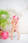 beach_ball bikini_top cosplay hair_ribbons kaname_madoka mashiro_yuki miniskirt pink_hair puella_magi_madoka_magica skirt swimsuit twintails rating:Safe score:0 user:nil!