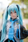 aqua_hair blouse cosplay detached_sleeves hatsune_miku headset pleated_skirt sanaka skirt tie twintails vocaloid rating:Safe score:1 user:pixymisa