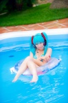 aqua_hair bikini cleavage cosplay hatsune_miku headset inner_tube mashiro_yuki pool project_diva swimsuit twintails vocaloid wet rating:Safe score:0 user:nil!