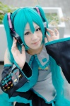 aqua_hair ayame blouse cosplay default_costume detached_sleeves hatsune_miku headset pleated_skirt skirt thighhighs tie twintails vocaloid zettai_ryouiki rating:Safe score:0 user:nil!