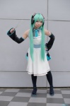 apron aqua_hair cosplay detached_sleeves hatsune_miku headset mizuhara_akio pleated_skirt skirt sweater_vest tagme_song thighhighs tie twintails vocaloid whisk rating:Safe score:0 user:nil!