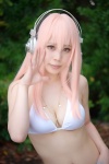 bikini cleavage cosplay headphones momokawa_hina necklace nitro_super_sonic pink_eyes pink_hair super_soniko swimsuit rating:Safe score:0 user:pixymisa