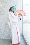 aqua_eyes cosplay fan hatsune_miku hood maitako multi-colored_hair robe tassels vocaloid rating:Safe score:0 user:pixymisa