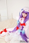 bed cosplay dress hat patchouli_knowledge purple_hair robe saku sweet_garden thighhighs touhou rating:Safe score:0 user:nil!