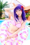 bikini cosplay fate/series fate/stay_night hair_ribbons inner_tube matou_sakura pool purple_hair sachi_budou side-tie_bikini swimsuit rating:Safe score:0 user:nil!