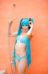 aqua_hair bikini cosplay hatsune_miku headset mashiro_yuki project_diva swimsuit twintails vocaloid rating:Safe score:1 user:nil!