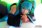 aqua_hair blouse chihane cosplay detached_sleeves hatsune_miku headset pleated_skirt skirt tie twintails vocaloid rating:Safe score:3 user:nil!