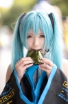 aqua_hair blouse cosplay detached_sleeves eating hatsune_miku headset sanaka tie twintails vocaloid rating:Safe score:1 user:pixymisa