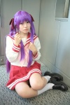 cosplay hair_ribbons hiiragi_kagami lucky_star naito purple_hair sailor_uniform school_uniform socks twintails rating:Safe score:1 user:nil!