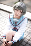 ayase_yoku cosplay glasses kneesocks nagato_yuki pleated_skirt sailor_uniform school_uniform silver_hair skirt suzumiya_haruhi_no_yuuutsu rating:Safe score:2 user:nil!