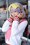 cosplay hairbow hiiragi_tsukasa lucky_star maritsuki_haru miniskirt pleated_skirt purple_hair sailor_uniform school_uniform skirt rating:Safe score:0 user:nil!