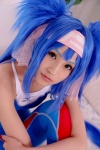 bed blue_hair bodysuit buyara cosplay hair_ribbons headband klan_klein macross macross_frontier twintails rating:Safe score:0 user:nil!