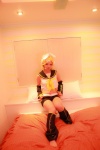 bed blonde_hair boots cosplay detached_sleeves hairbow headphones kagamine_rin panties shorts tanaka_mana vocaloid rating:Safe score:0 user:shiwahentai