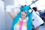 aqua_hair cheerleader_uniform collar cosplay detached_sleeves hair_ribbons hatsune_miku mogu sing_and_smile_(vocaloid) tie tubetop twintails vocaloid rating:Safe score:0 user:pixymisa