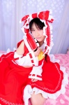 cosplay hairbow hakurei_reimu hanausagi_manyu jumper miko touhou rating:Safe score:0 user:LittleSweetLoli