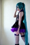 aqua_hair blouse cosplay fishnet_stockings hatsune_miku noa petticoat pleated_skirt skirt thighhighs tie twintails vocaloid rating:Safe score:2 user:pixymisa