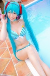 aqua_hair bikini cleavage cosplay hatsune_miku headset mashiro_yuki pool project_diva swimsuit twintails vocaloid wet rating:Safe score:0 user:nil!