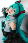 aqua_hair cosplay default_costume detached_sleeves hatsune_miku headset mizuno_shiro pleated_skirt skirt thighhighs tie twintails vocaloid rating:Safe score:0 user:nil!